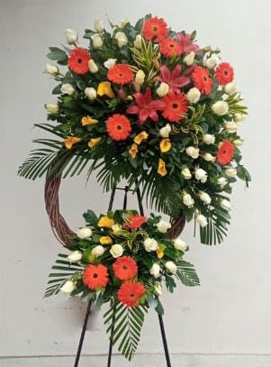 Corona Condolencias Lirios rosas y gerberas